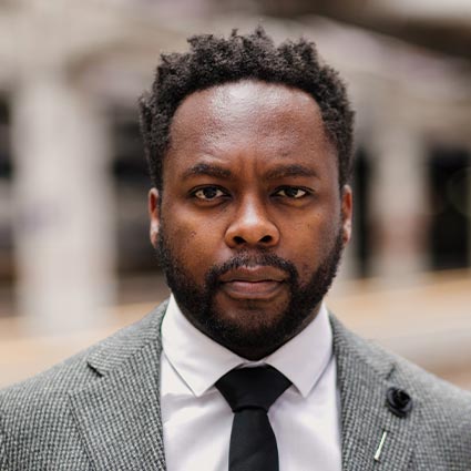 Headshot of Will Liverman
