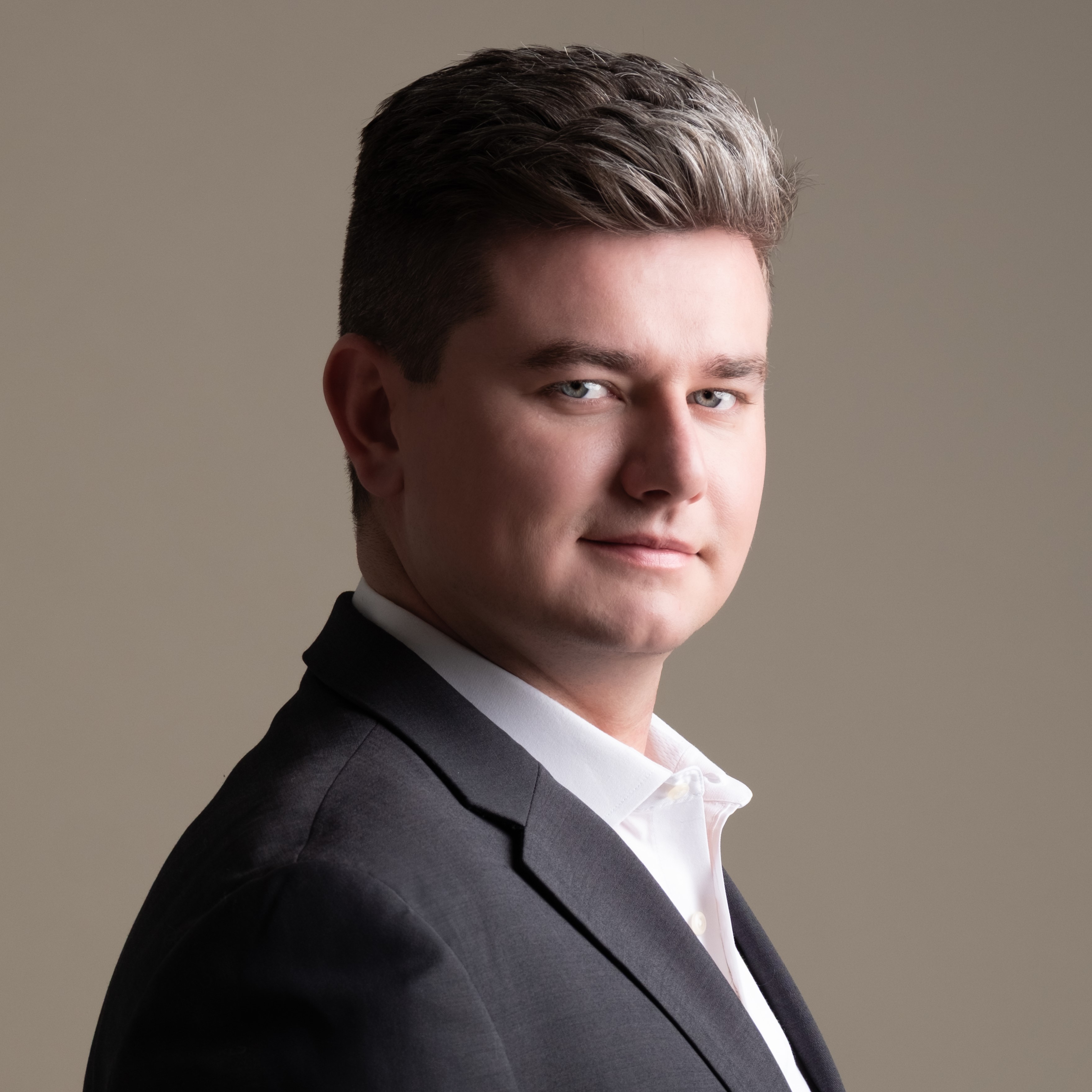 Headshot of Ben Reisinger