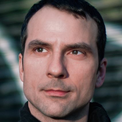 Headshot of David Adam Moore