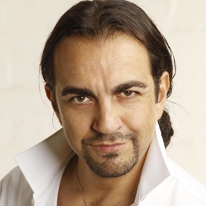 Headshot of Claudio Sgura