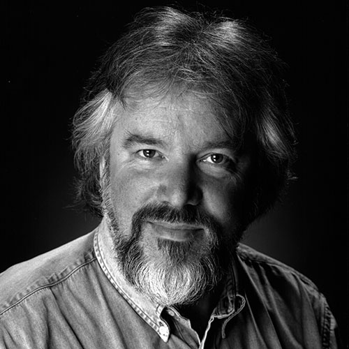 Headshot of John Tomlinson